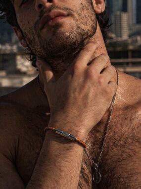 Tod’s Woven Leather Bracelet Black Orange 8” Silver Tone Clasp Made in Italy